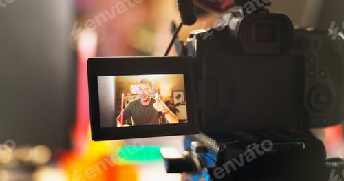 Preview: Happy Man Displayed on Camera LCD Screen