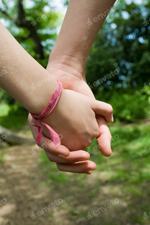 Preview: Teenage couple holding hands