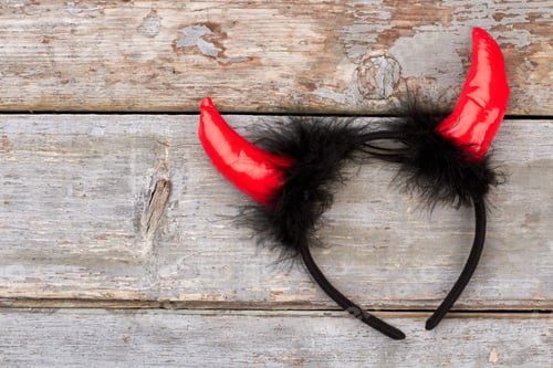 Preview: Devil hair band on wooden background.