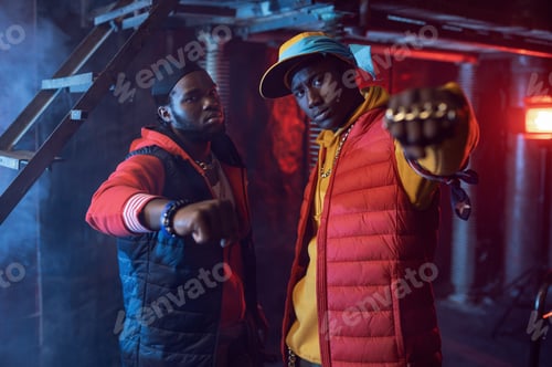 Preview: Two rappers with gold jewelry in cool studio