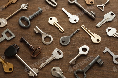 Preview: Many different keys on wood