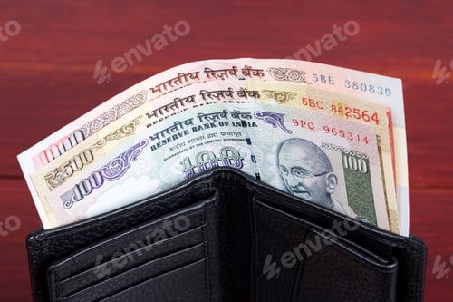 Preview: Old Indian money in the black wallet