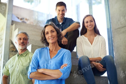 Preview: Shot of a mother and father standing in front of their adult children on the stairs