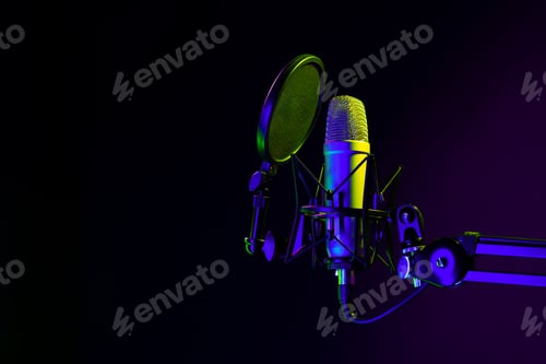 Preview: Professional microphone against black background in studio