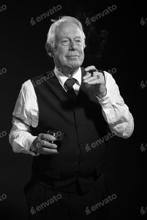 Preview: Retro Senior Business Man With Whiskey Smoking Cigar. Black And White Photo.