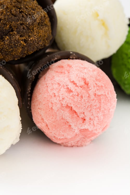 Preview: Ice cream scoops with chocolate-covered cones creating colorful delight