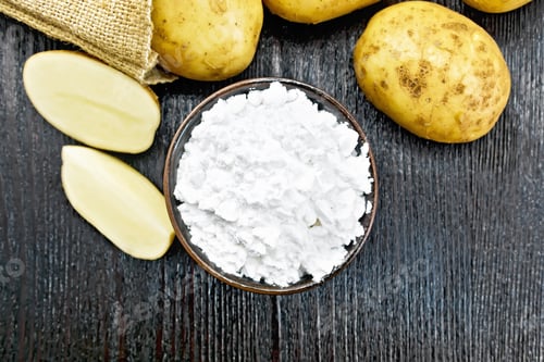 Preview: Starch potato in clay bowl on board top
