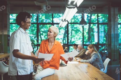 Preview: cinematic image of people working in a start up business.