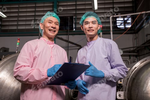 Preview: Worker Checking quality or checking stock of glass bottle in beverage factory.