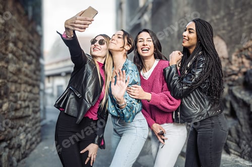 Preview: Girlfriends taking selfie in the street