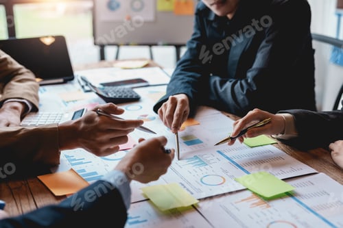 Preview: Meeting of business people work together as a team by presenting graphs and charts and discuss the r