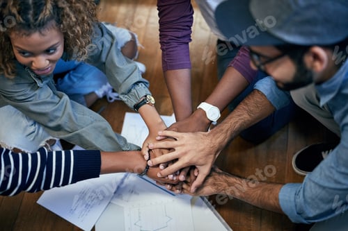 Preview: Cropped shot of university students working together in class
