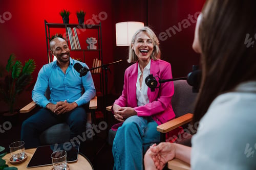 Preview: Content creators broadcasting live podcast interview using microphones
