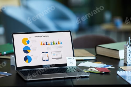 Preview: Screen of laptop with group of financial diagrams and illustrations