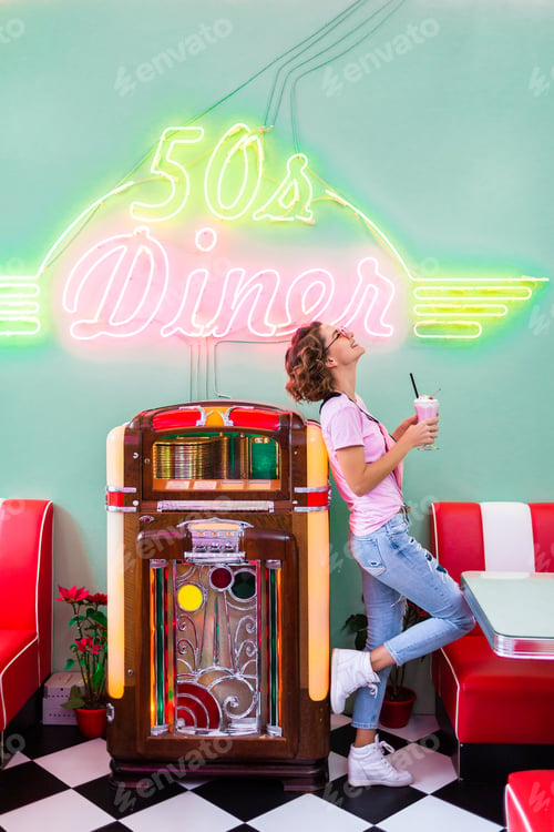 Preview: stylish smiling woman in retro vintage cafe