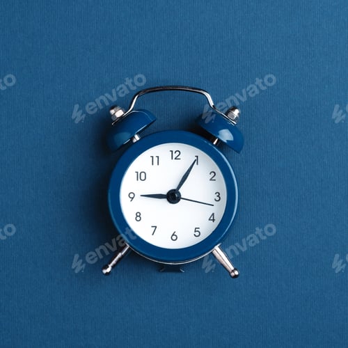 Preview: Classic Alarm Clock on Blue Background.