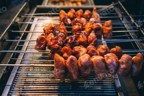 Preview: Marinated shashlik preparing on a barbecue grill