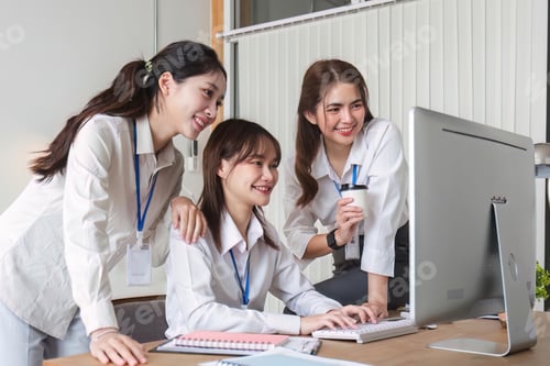 Preview: Business People Meeting using laptop computer,calculator,notebook,stock market chart paper for