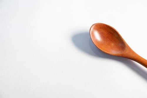 Preview: Wooden spoon on isolated white background