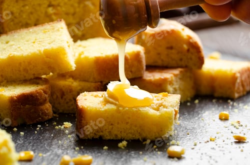 Preview: Closeup view at Sweet Honey Butter homemade cornbread slices on kitchen table