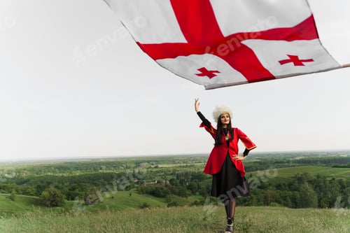 Preview: Georgian girl with flag dancing national styles on hills, culture and identity