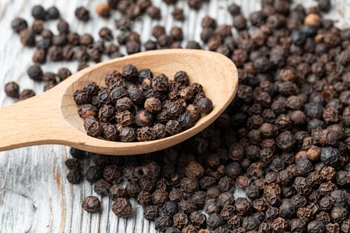 Preview: black pepper on wooden spoon