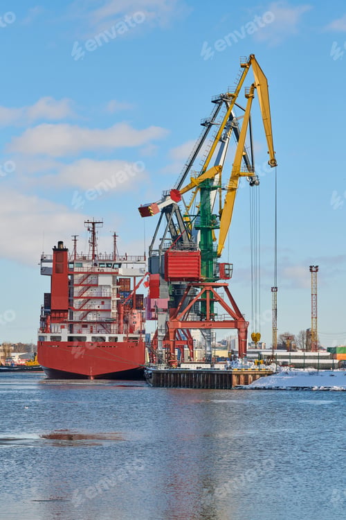 Preview: Moored ships and harbor cranes in port