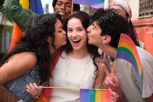 Preview: Friends kissing girl on cheek at LGBT pride parade