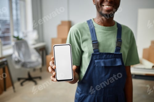 Preview: Worker showing the screen of smartphone