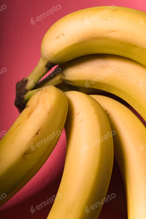 Preview: Bunch of bananas on the bright pink background