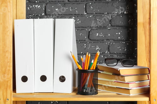 Preview: File folders, standing on the shelves at office