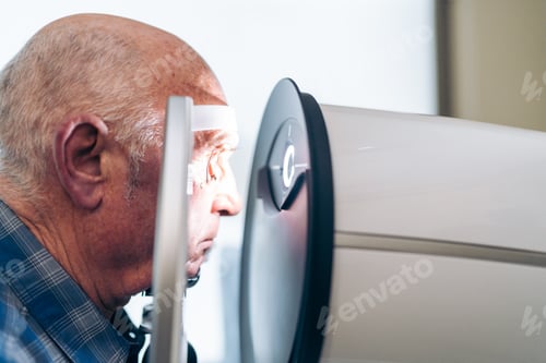 Preview: Elderly Man Undergoing Noninvasive Glaucoma Diagnosis with Laser Eye Scanner