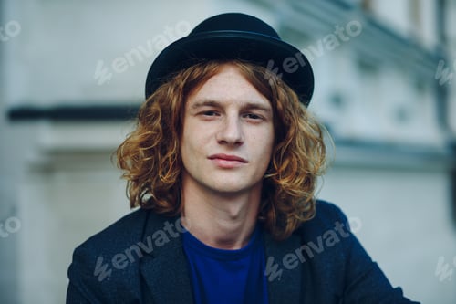 Preview: Close-up portrait of young reddish curly man