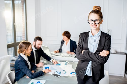 Preview: Business people during the conference in the office