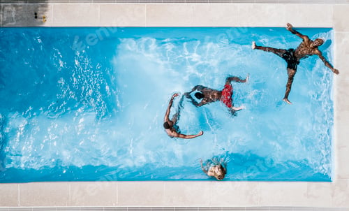 Preview: African friends play in the pool happy.