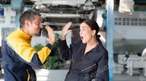 Preview: Portrait of engineer and auto mechanic with working on engine repairs in car garages