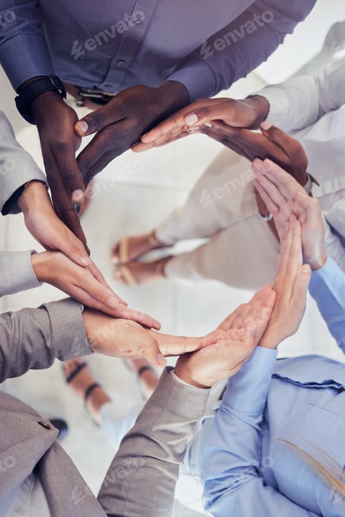 Preview: Hands, collaboration and workflow with a business team standing in a circle at the office from abov