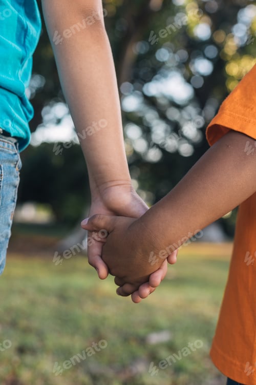 Preview: two children holding hands in the forest, brothers together,