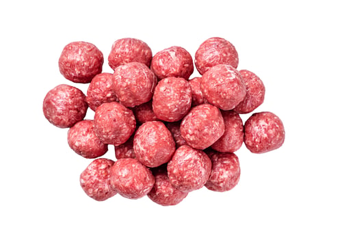 Preview: Uncooked Raw beef and pork meatballs with spices Isolated on white background, top view.