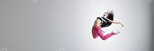Preview: Energetic Dancer Leap with Copy Space Wide Banner