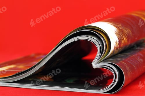 Preview: Selective focus image of magazine folded into a heart shape