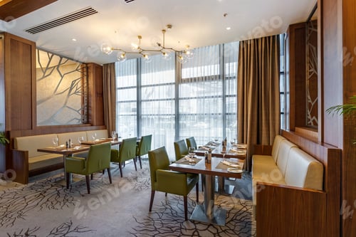 Preview: MINSK, BELARUS - MAY 2018: banquet table with appliances in an elite luxury restaurant