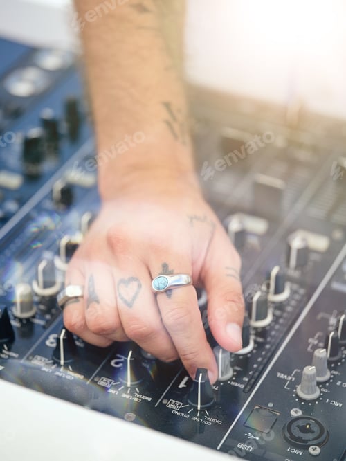 Preview: Crop man using professional DJ mixing console