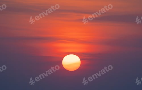 Preview: Sunset sky. Abstract nature background. Dramatic blue and orange, colorful clouds at twilight time.