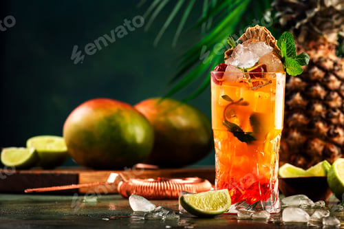 Preview: Alcoholic cocktail with vodka, pineapple juice, mango, red syrup and ice. Long drink