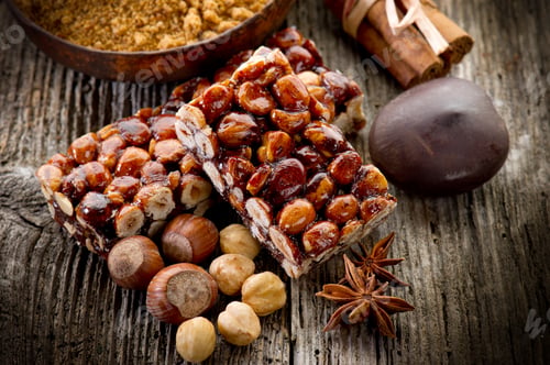 Preview: hazelnut brittle on wood with ingredients