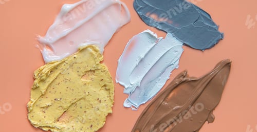Preview: Different smears of cosmetics. Selective focus. Wet.