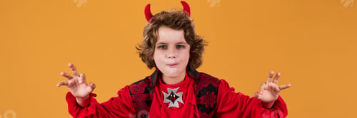 Preview: Child in costume of vampire or demon