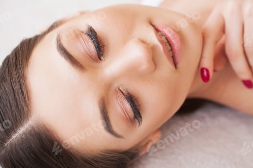 Preview: Woman Eye with Long Eyelashes. Beautiful Young Woman During Eyelash Extension