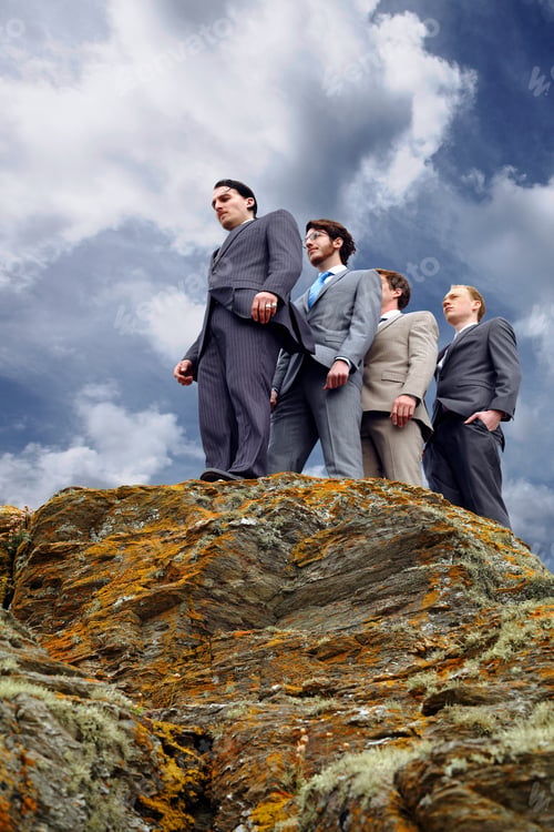 Preview: Businessmen standing on cliff edge